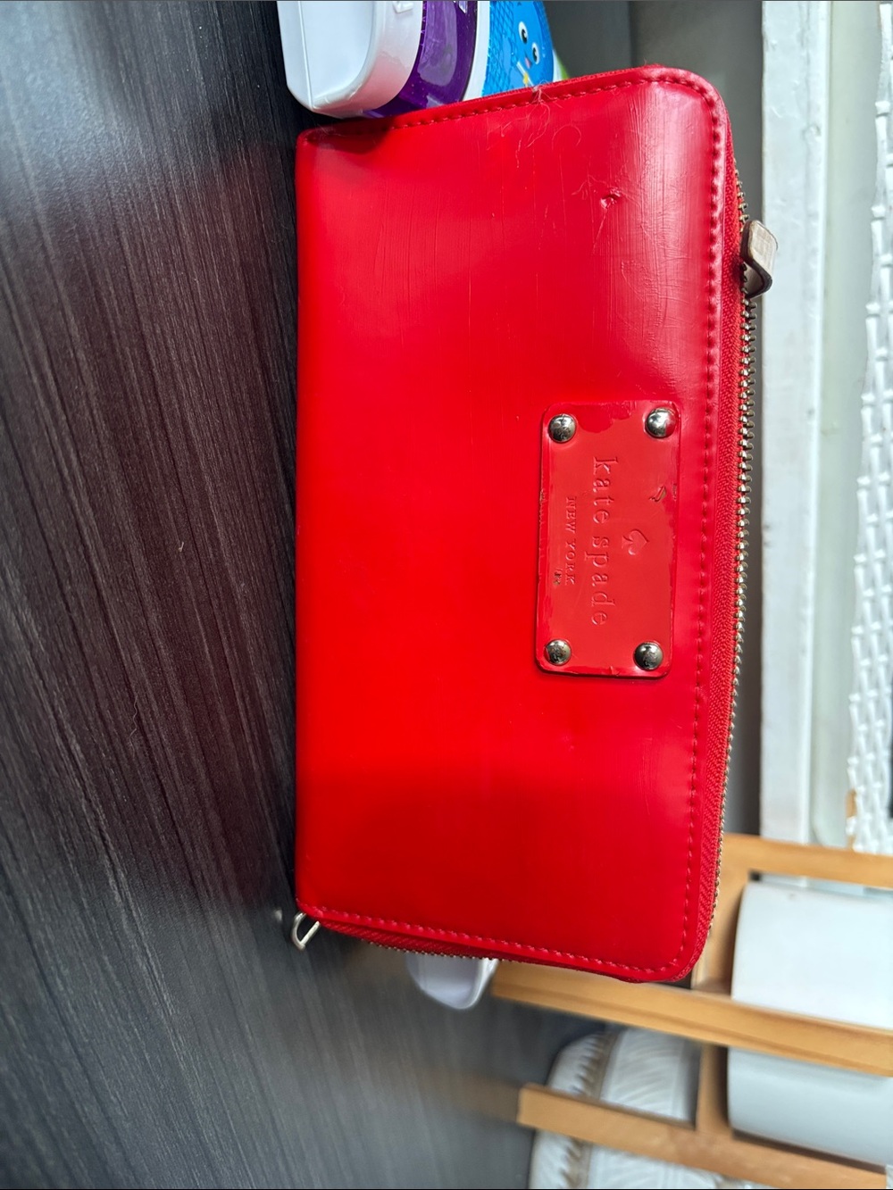 kate spade Red Zip-Around Leather Wallet with Logo Plaque